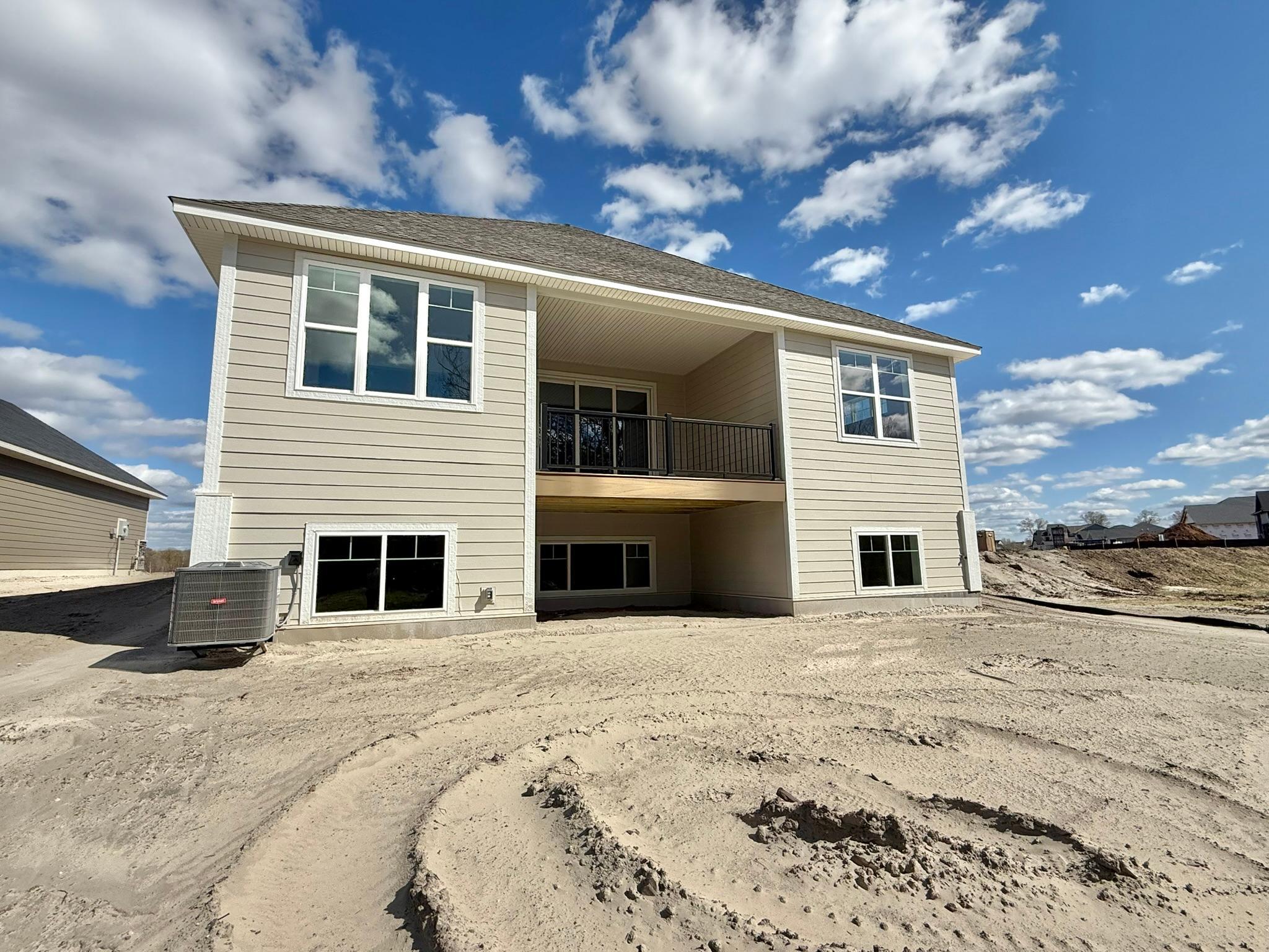 The covered back deck offers outdoor use, rain or shine!