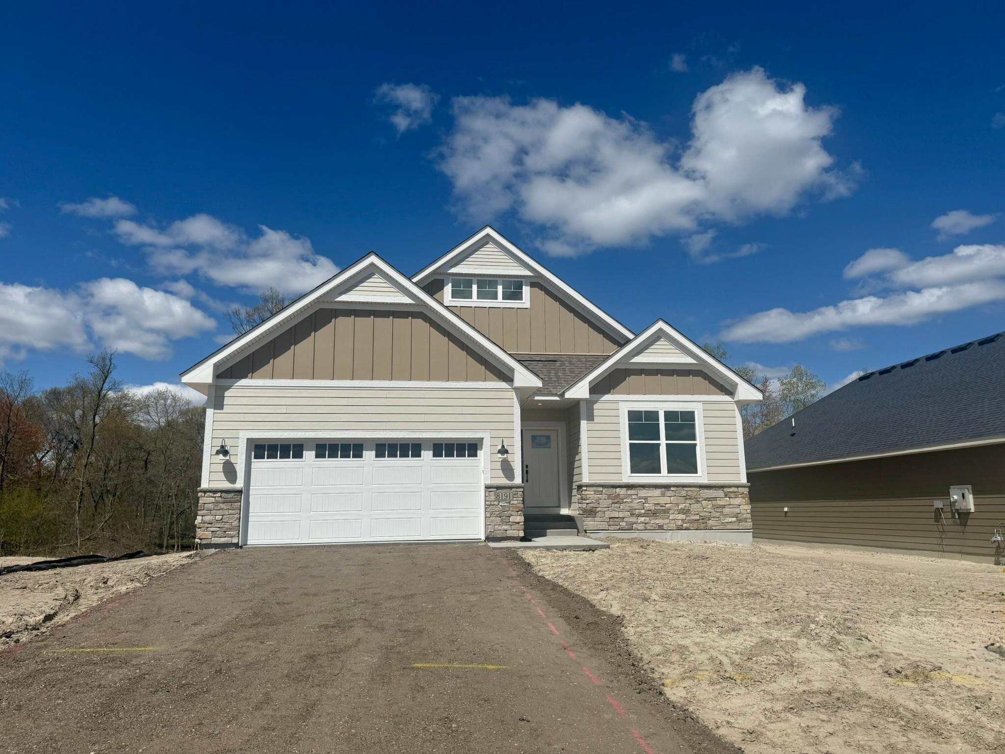 Check out this gorgeous three bedroom, three bathroom villa with finished lower level! Maintenance free lifestyle, as lawn care and snow removal are included in the HOA!