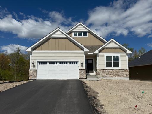 Check out this gorgeous three bedroom, three bathroom villa with finished lower level! Maintenance free lifestyle, as lawn care and snow removal are included in the HOA!