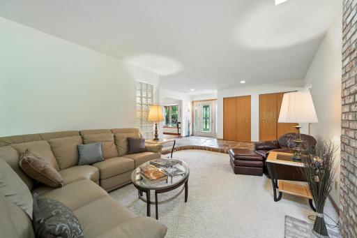 Livingroom/9' ceilings view of stone foyer