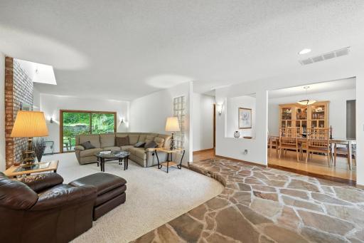 1000HeritageLane View of stone foyer living and dining rooms
