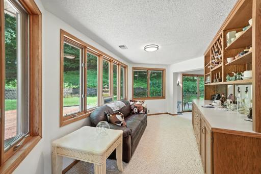 1000HeritageLane Den with storage and liquor rack