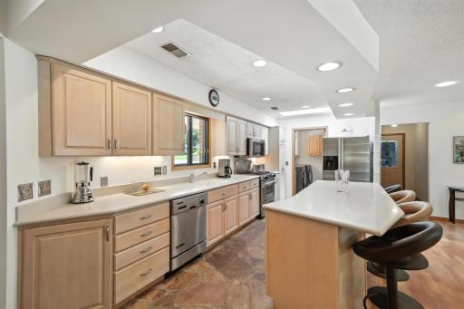 1000HeritageLaneKitchen Island looking to laundry