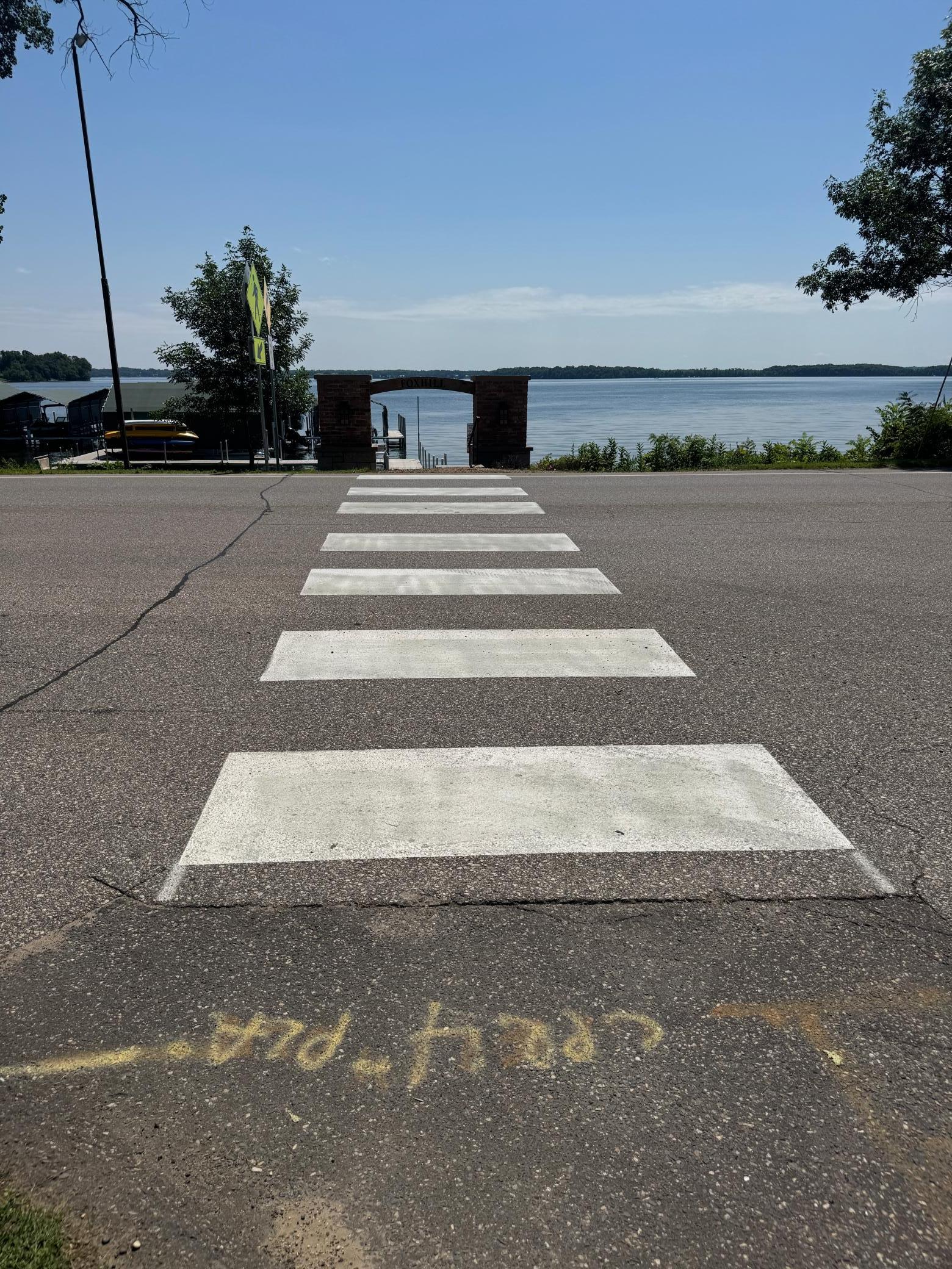 County Painted crosswalk also has signage to stop for Pedestrians on Shoreline drive.