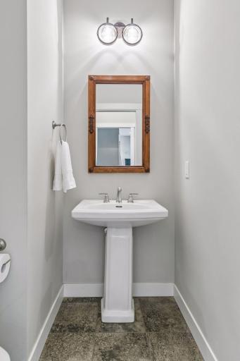 Convenient 1/2 bath off of the kitchen & mudroom.