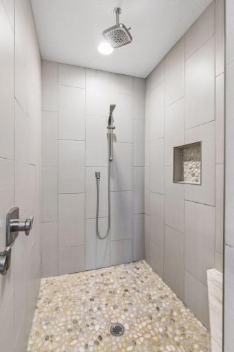Oversized custom tile / stone shower.