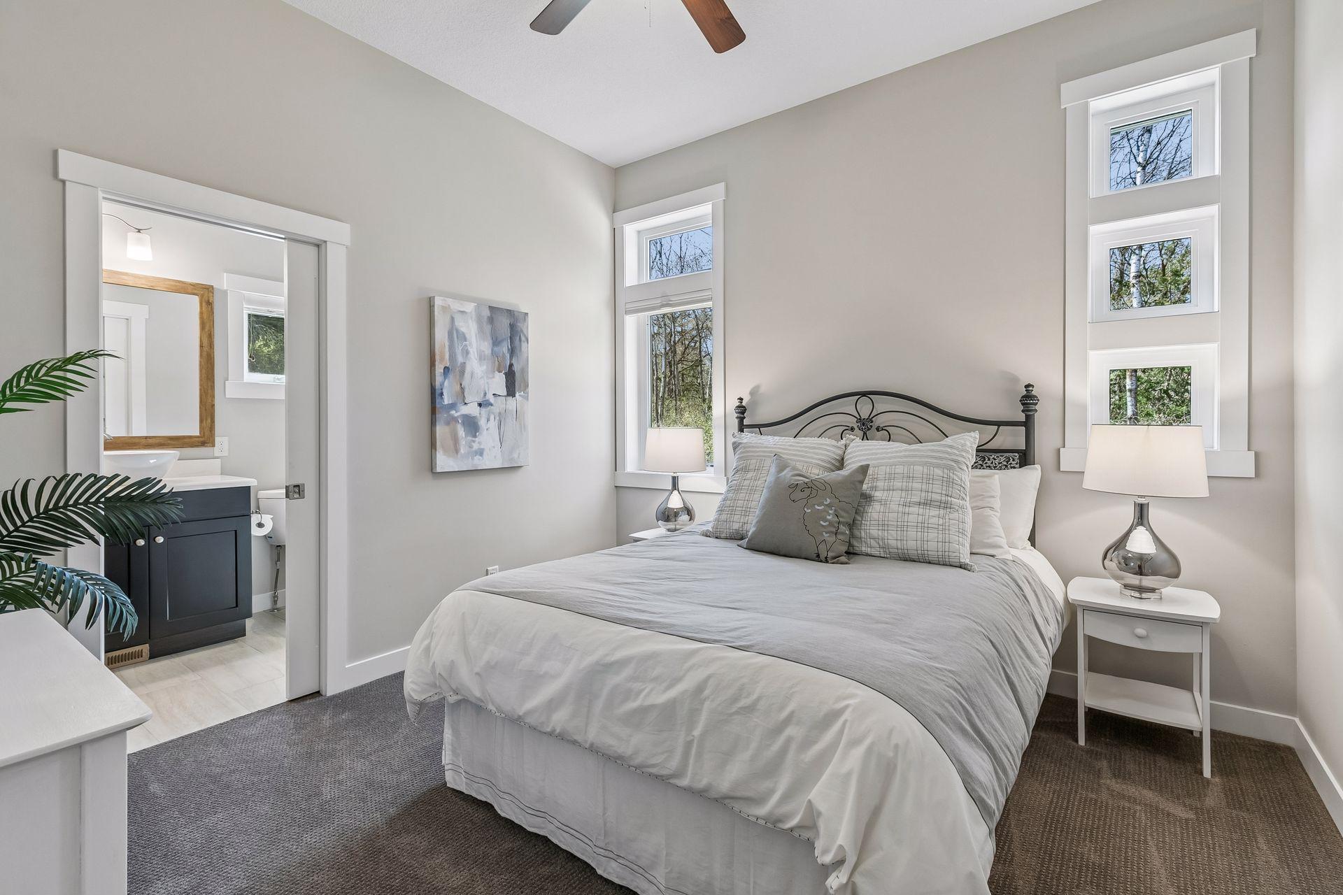 The main level guest room w/ en suite is perfect for multi-generational living.