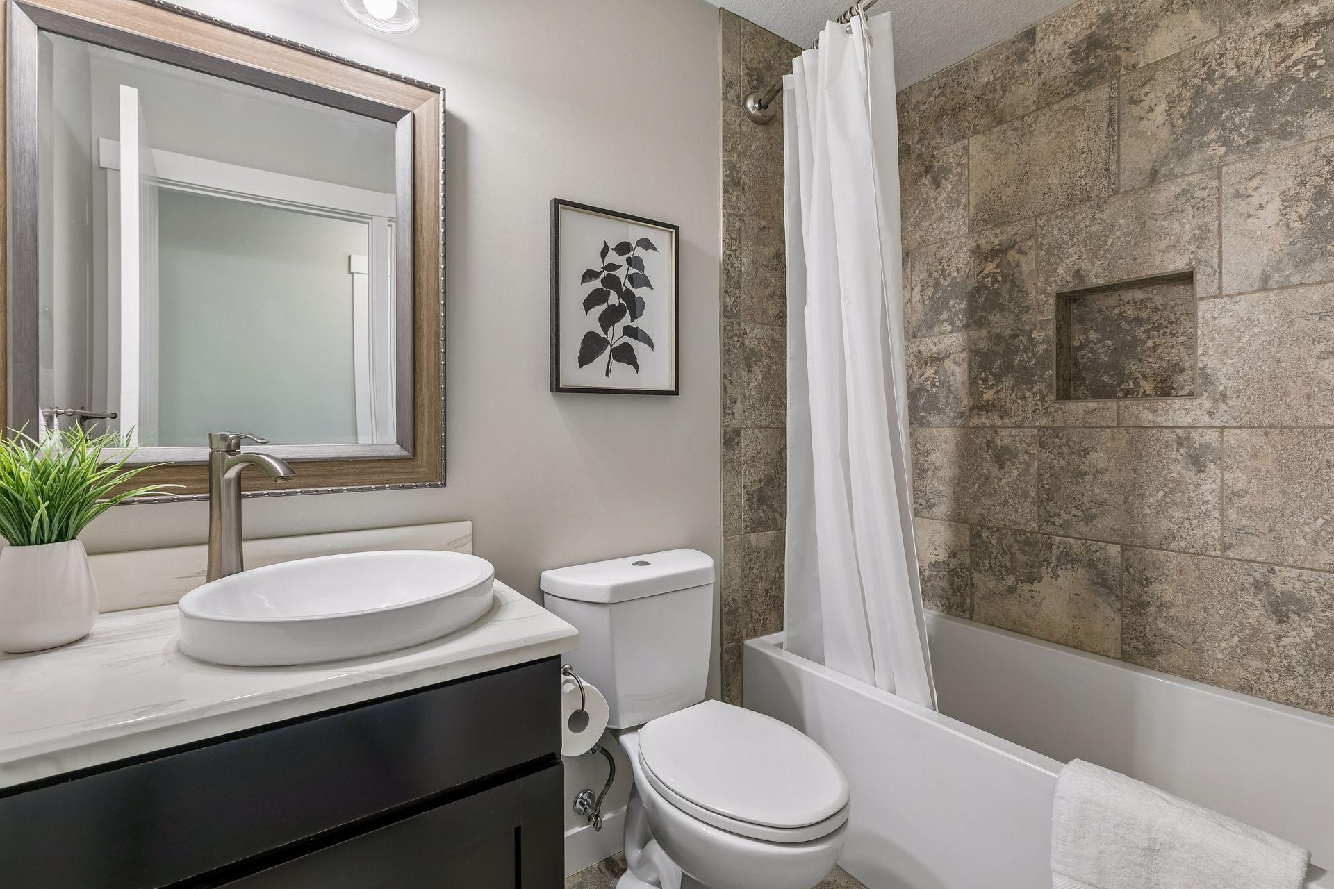 Full bath outside of the 2nd & 3rd bedrooms on the upper level.