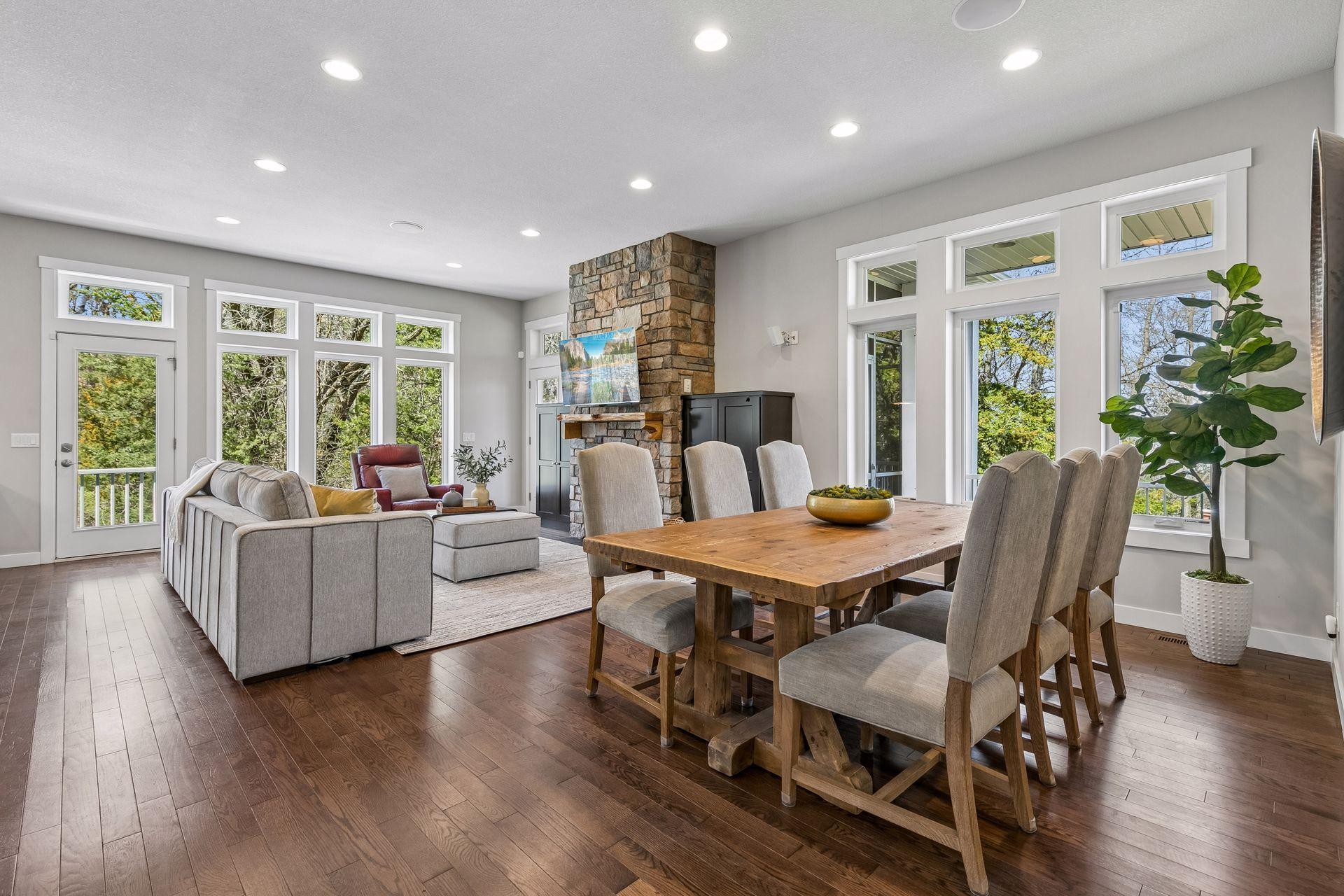 Stunning & spacious main level with abundant large windows providing tranquil wooded views!