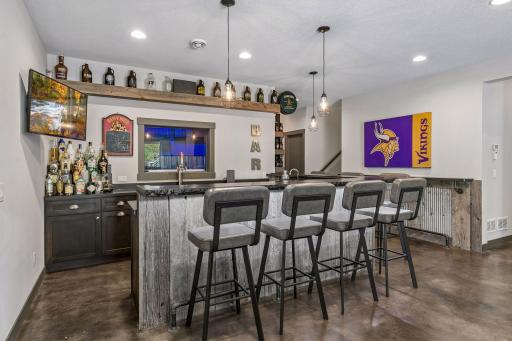 Modeled after a brewery! Cheers to more custom details including heated concrete floors, sound absorbing panels & 9' ceilings.