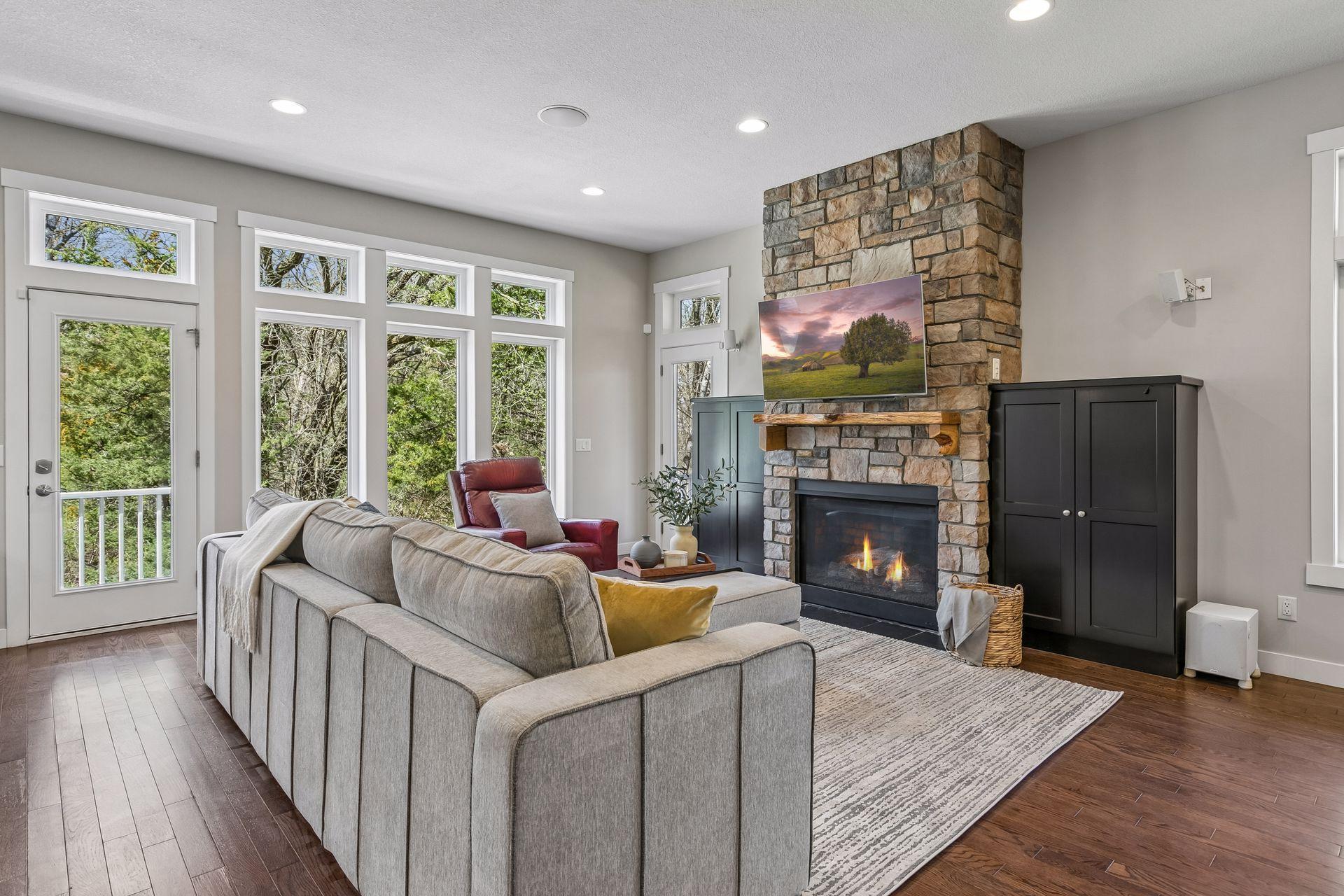 Both cozy & beautiful is this living room with gas fireplace.