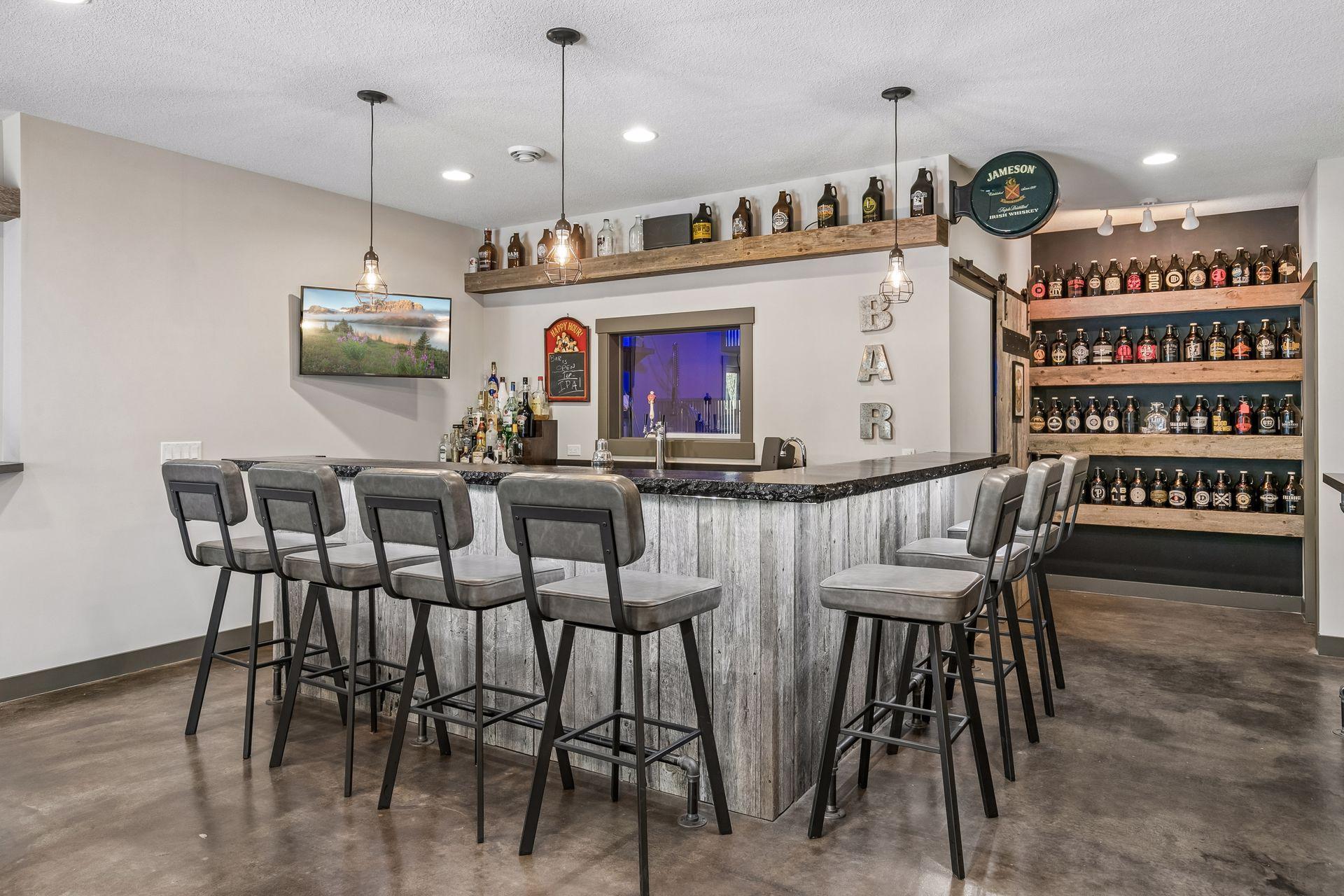 Game day & entertaining made easy with the custom concrete bar & your very own brew room!