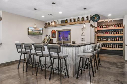 Game day & entertaining made easy with the custom concrete bar & your very own brew room!