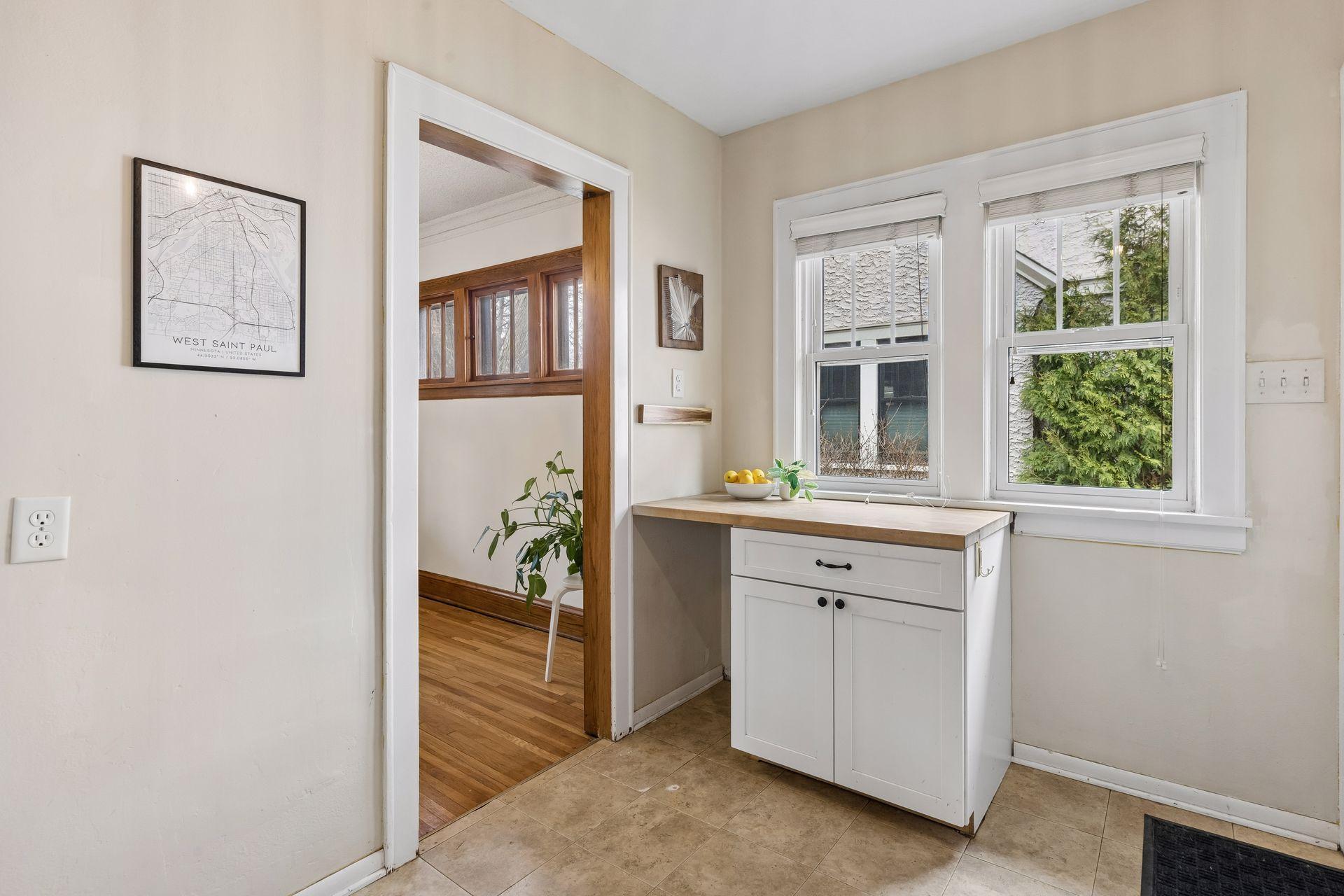 Here is the kitchen facing the other direction, showing more of its counter space, and even a spot to tuck a stool.