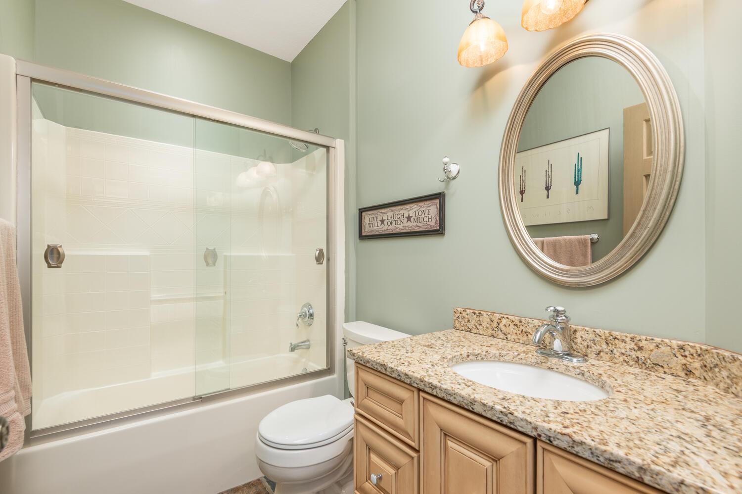 Another full bath in the upper level is very tastefully done. There is also a large walk in storage closet in the hallway.