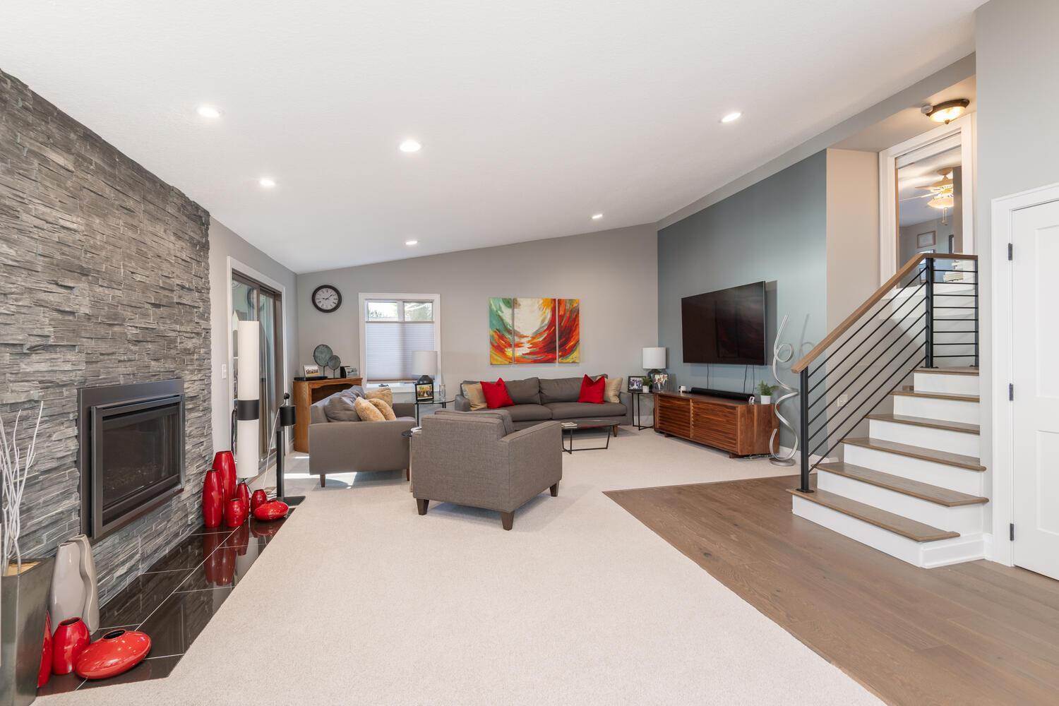 Greet guests in the living area. The owner recently had this level remodeled with a contemporary feel!