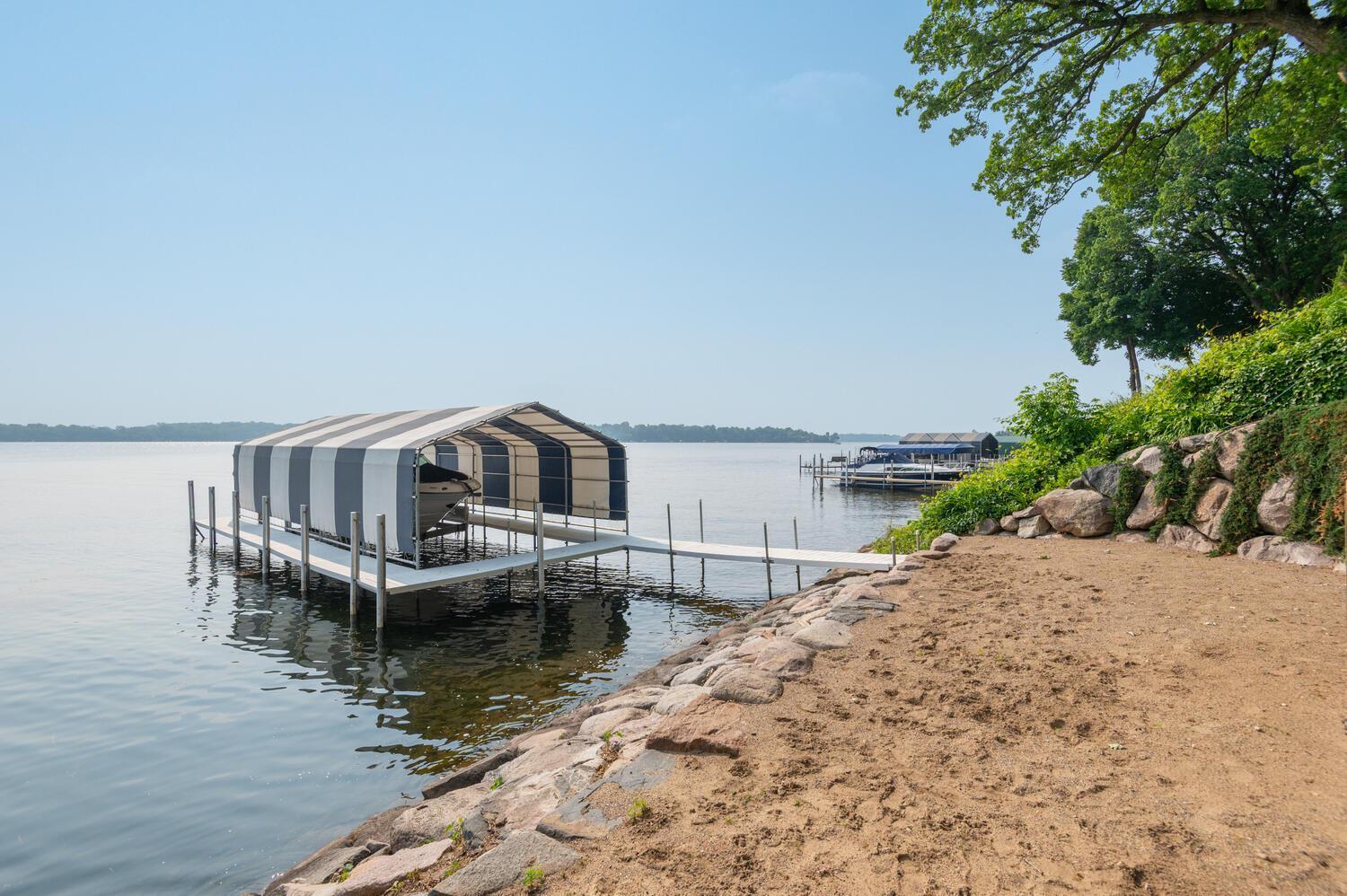 The resort like beach waiting for you at the waters edge! Enjoy clear water and sandy bottom here too.