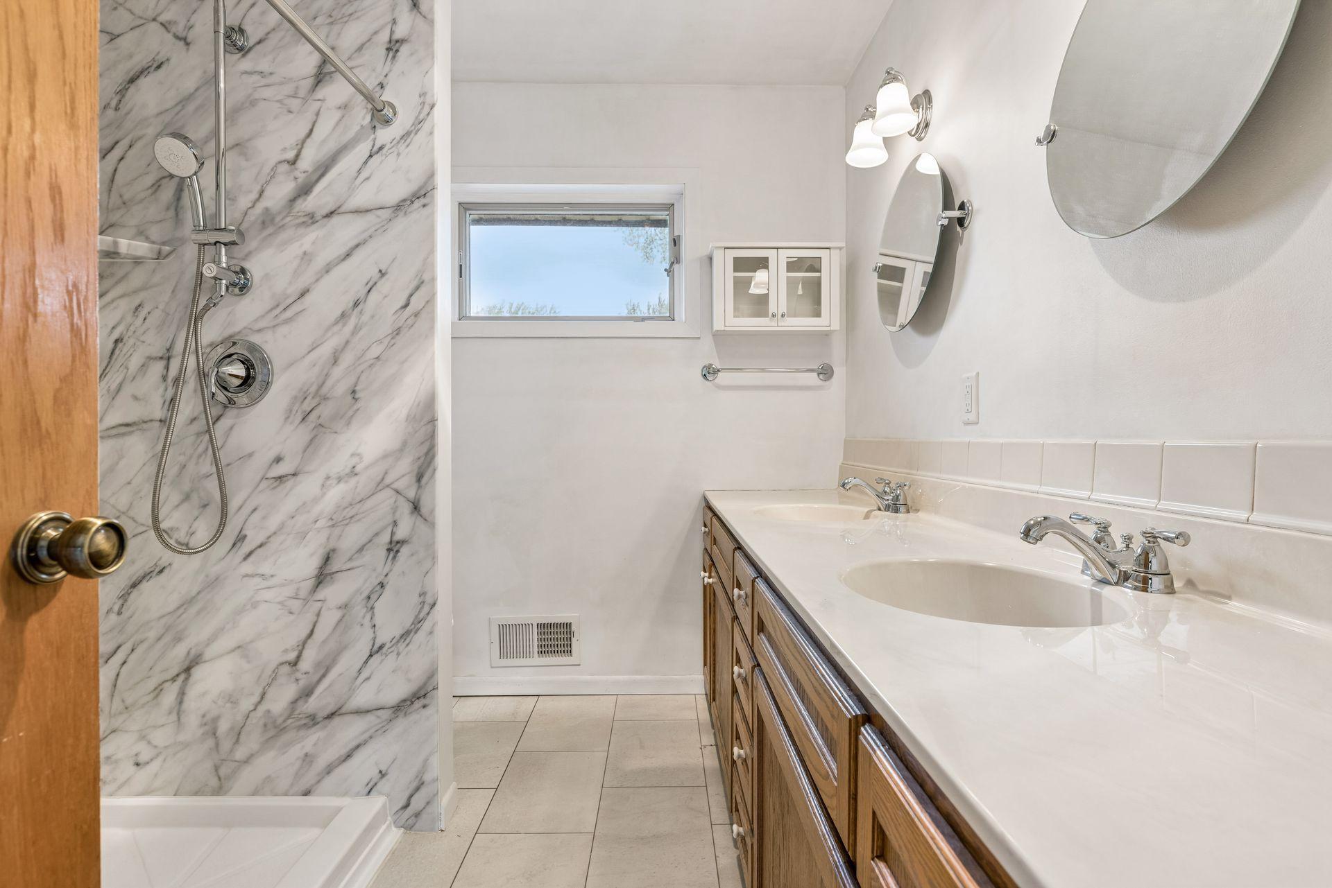 This primary bath was remodeled in 2024.