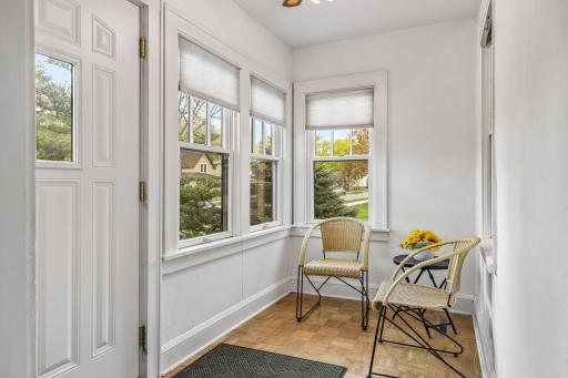 Everyone loves a front porch. Features include a parquet floors, newer front door & replacement windows.
