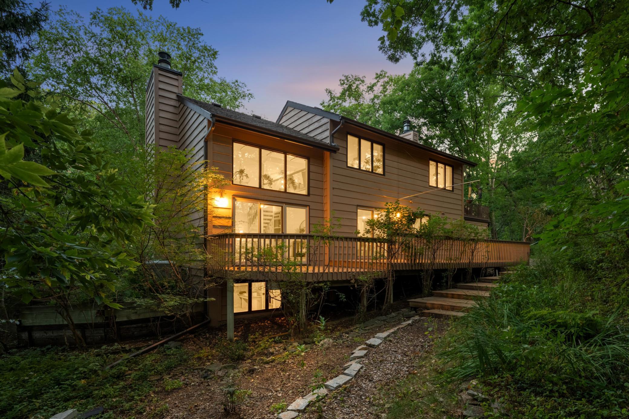 Enjoy the expansive back deck, overlooking a wooded sanctuary with visiting birds and deer. Nearby the Innsbruck Nature Center and walking trail.