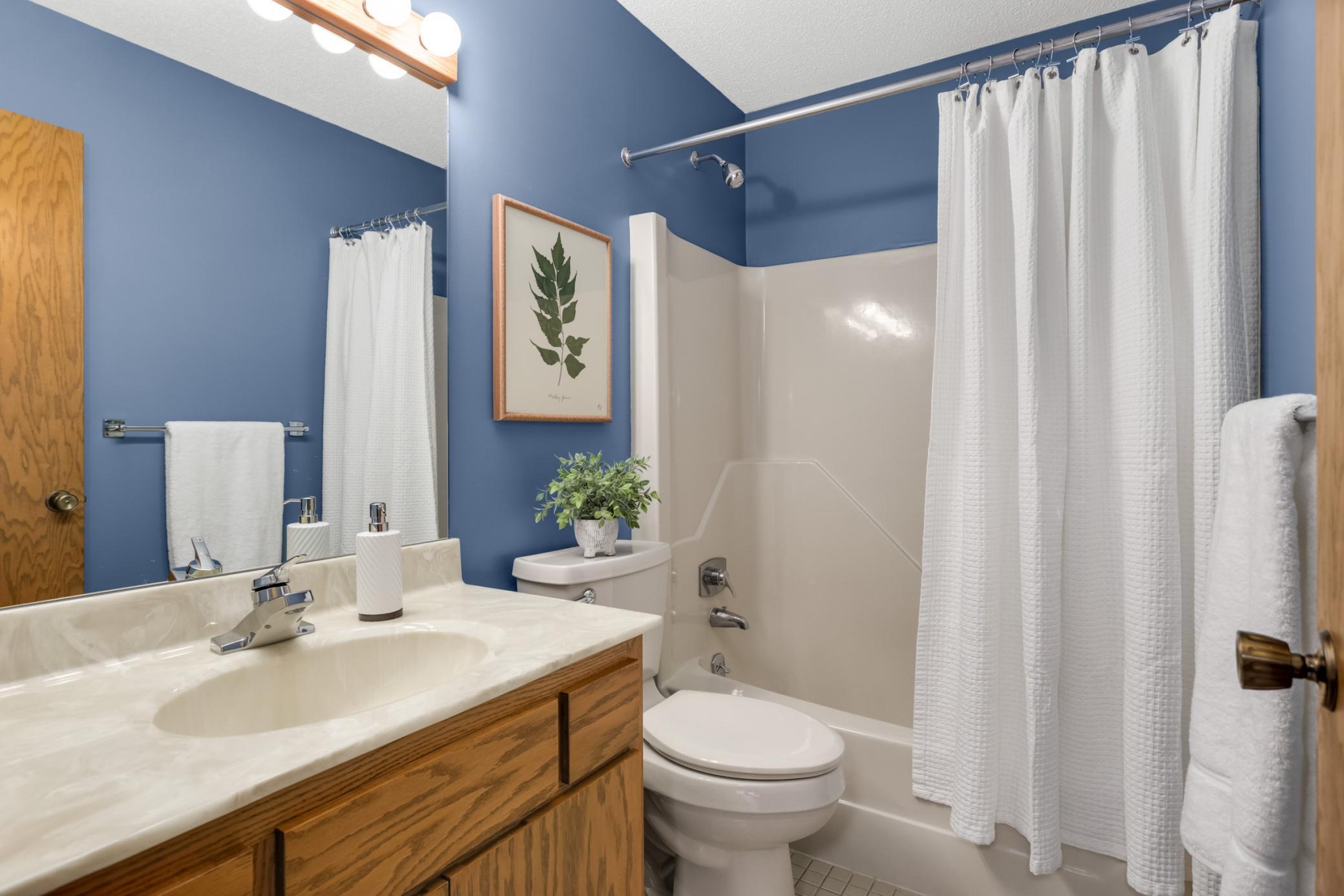 The upper level includes a convenient full bath with a shower/tub combination.