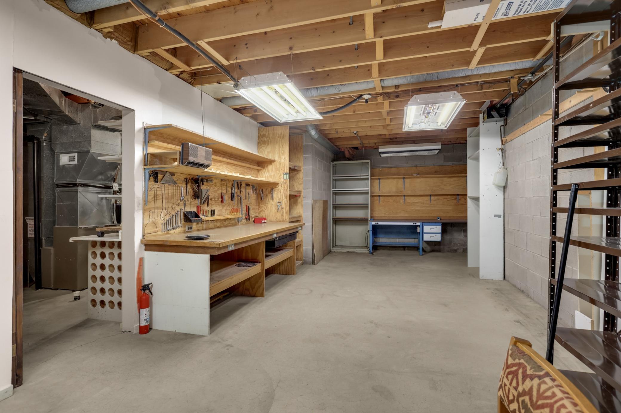 The expansive 29-by-12-foot workshop provides ample room for tools, projects, hobbies and additional storage.
