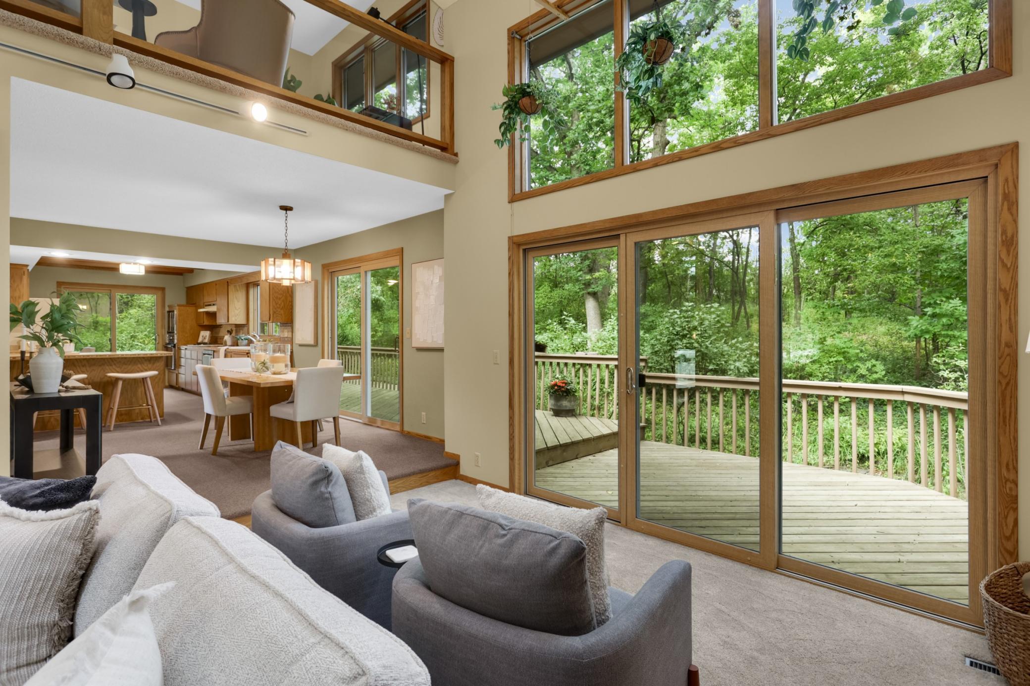 Inside, you'll love the soaring ceilings, effortless layout, and dramatic floor-to-ceiling windows that frame the beautifully landscaped views.