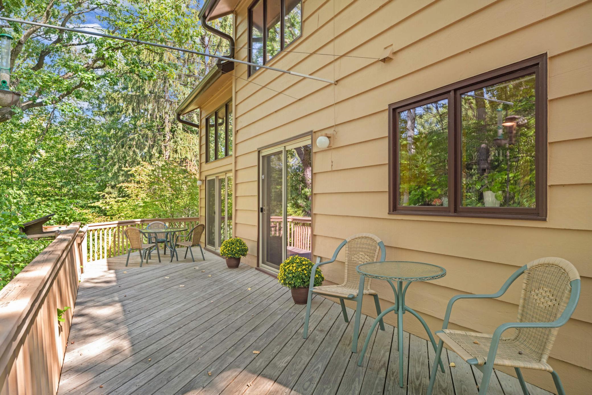 Additional photo from 2022 highlighting the expansive deck, with plenty of room for multiple seating areas and effortless outdoor entertaining.