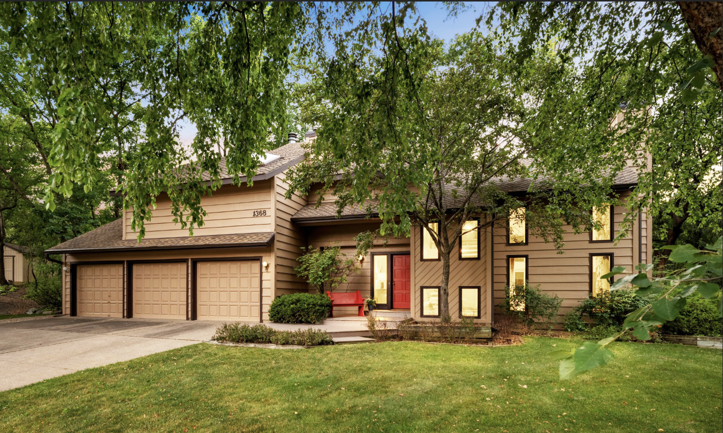 Welcome home to 1368 32nd Ave NW, ideally situated at the end of a quiet cul-de-sac and surrounded by beautiful, mature landscaping.