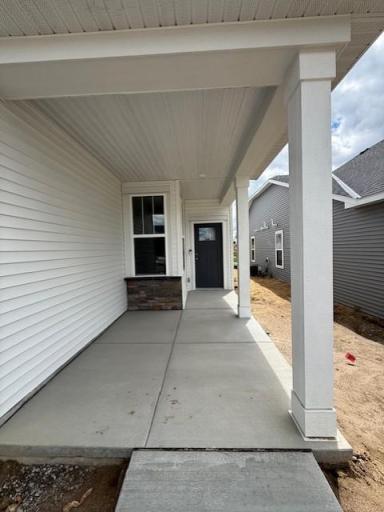 High-quality modern materials, including vinyl siding, stone accents, and contrasting trims combine to create a sophisticated and durable exterior.
