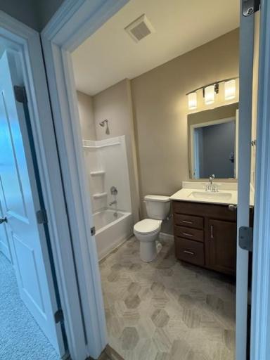 Generous sized secondary bathroom with a large vanity, ample counter space and under-sink storage provides both practicality and style, ideal for everyday routines
