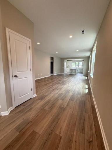 The welcoming entryway sets the tone for the home with clean lines, natural light, and inviting finishes.