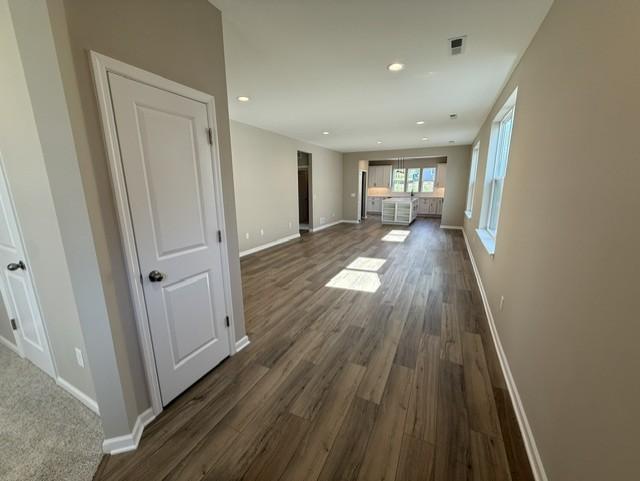 Open floorplan creates a seamless connection between the family room, kitchen, and dining areas—ideal for entertaining and family togetherness.