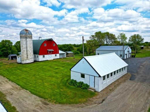 This beautifully repurposed farm building has been transformed into an exceptional exercise space, blending rustic character with modern functionality.