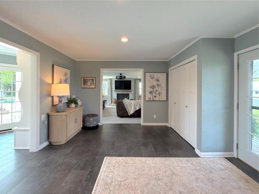 A welcoming foyer greets you with durable flooring, soft natural light, and a comfortable sense of space as you enter the home.