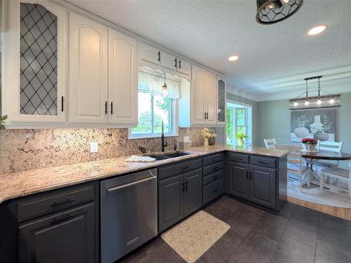 The kitchen flows easily into the dining area and living room, creating a functional layout ideal for everyday living and comfort.