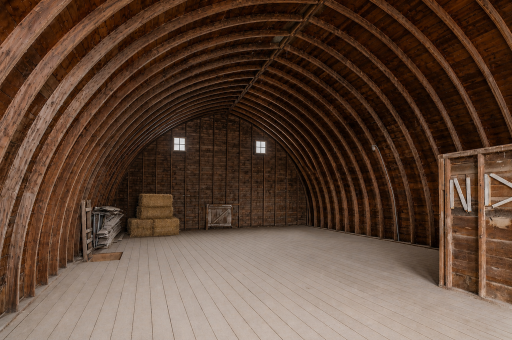 The upper floor of the barn is well suited for storage offering wonderful natural light - this barn delivers flexibility with wide open spaces.
