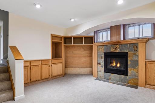 L:ower level family room with new fireplace