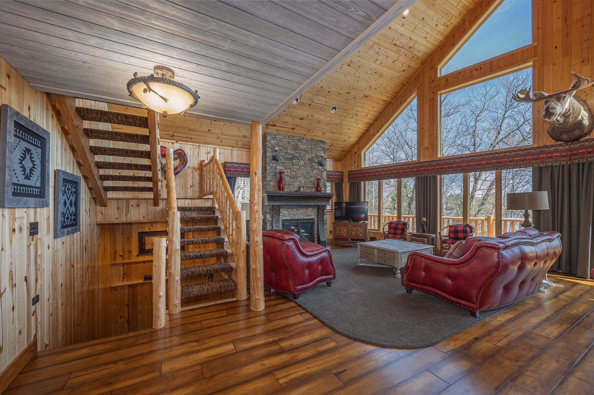 Additional views of living room and stairwell