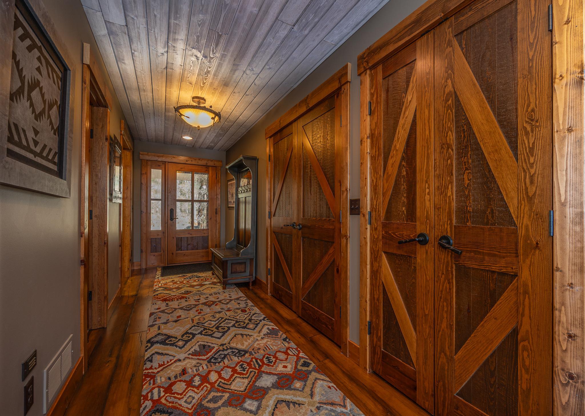 Beautiful entryways with custom wood closet doors