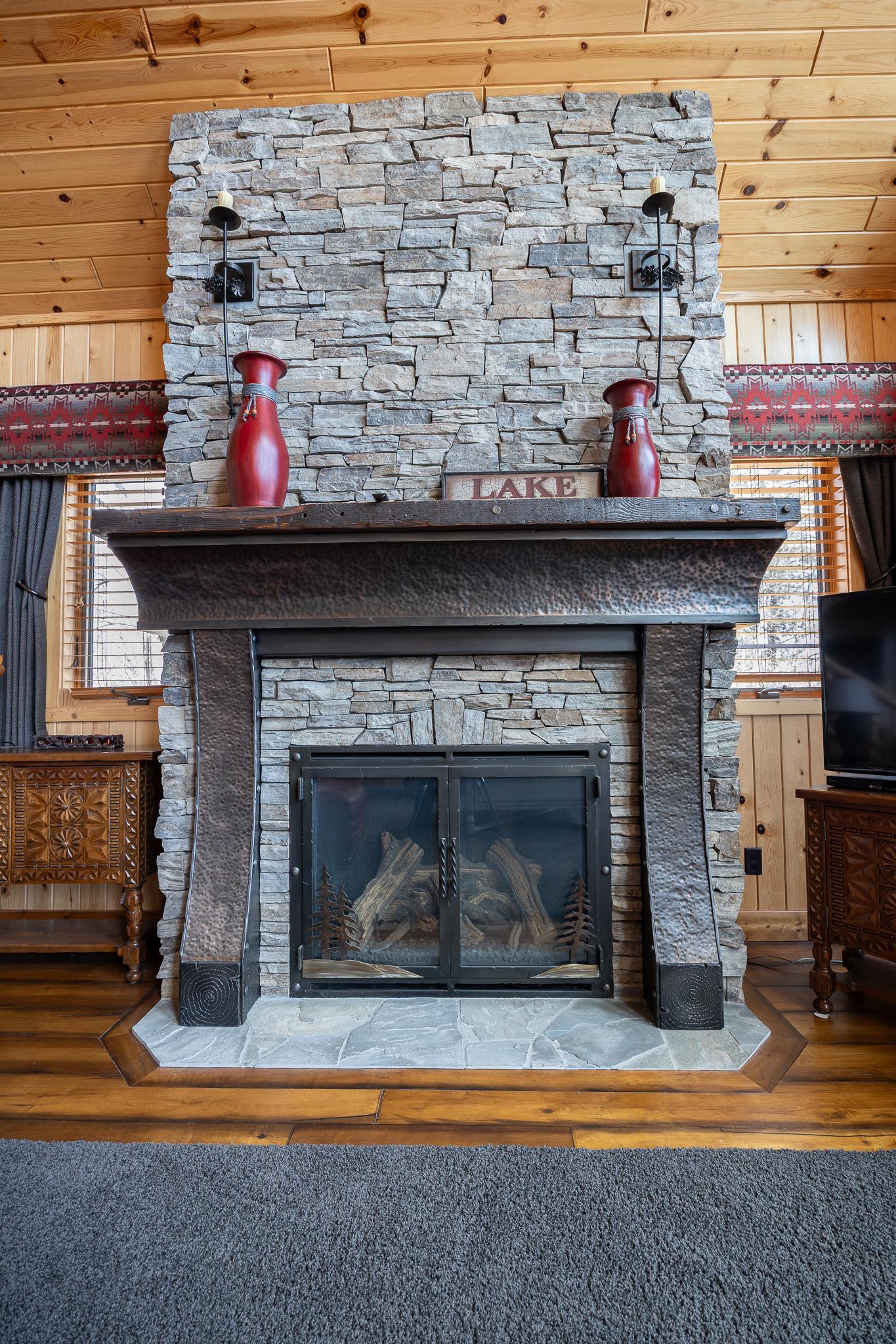Gas burning stone fireplace