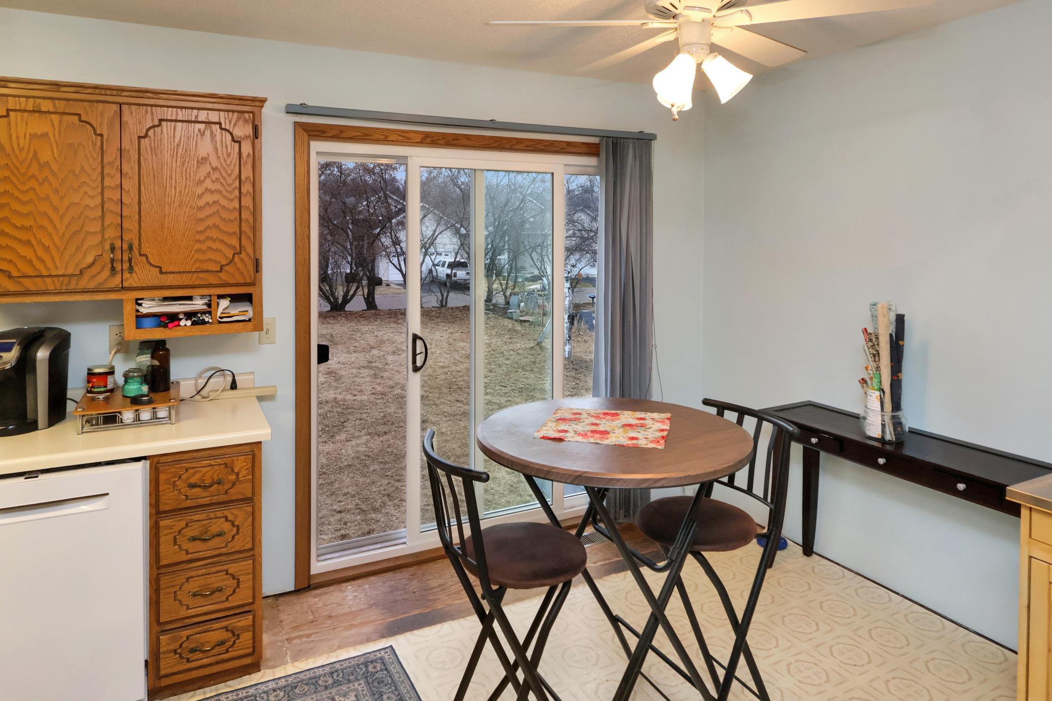 Dining area with a newer patio door leading to your future deck..jpg