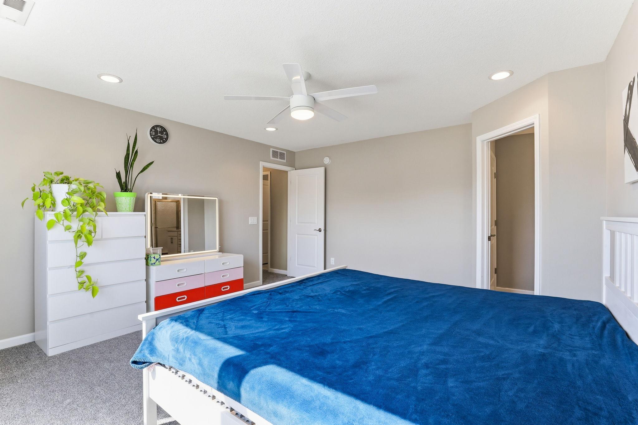 Two dedicated doors in the primary suite lead to the walk-in closet and private ensuite, keeping the bedroom calm, uncluttered, and focused entirely on rest.