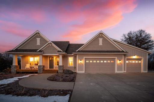 This exceptional 5-bedroom, 4-bathroom custom modern Craftsman home offers a rare combination of refined design, expansive space, and breathtaking natural surroundings, set on 2.81 private acres of restored prairie with a scenic wooded backdrop.