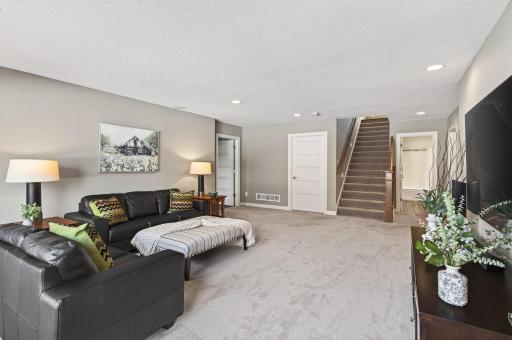 The walkout lower level enhances the homeâs versatility, showcasing a spacious family room with Dolby 5.1 surround sound and direct access to the back patio, perfect for indoor-outdoor entertaining!