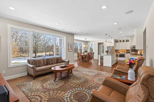 The living room continues the airy feel with oversized windows and immersive Dolby 7.1 surround sound.