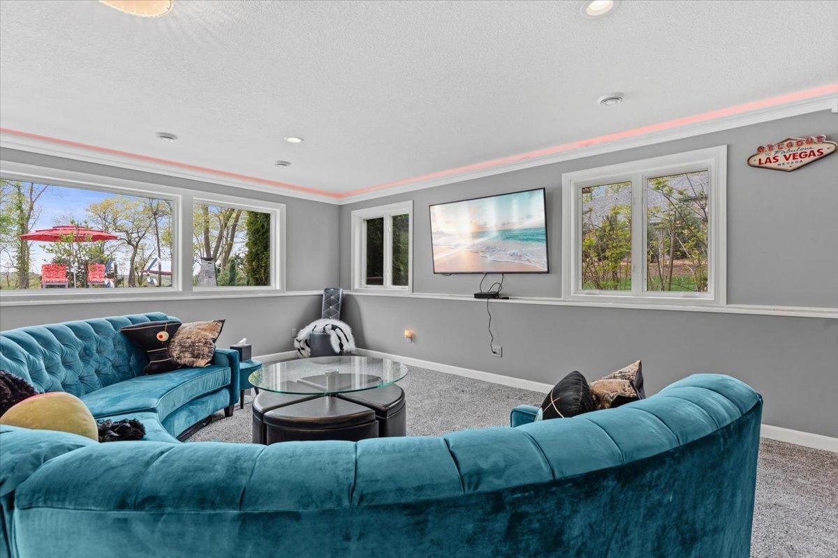 Recreation Room looking out at the pool & expansive river views