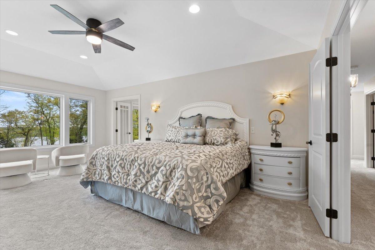 Primary Suite with large windows overlooking the Mississippi River