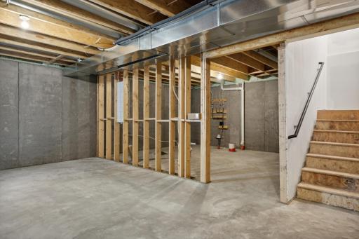 (Photo of a decorated model, actual finishes will vary.) The unfinished basement gives so much opportunity for your storage needs.