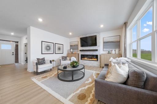 (Photo of a decorated model, actual finishes will vary.) The Great Room is a natural gathering space within the home, perfect for lounging on the couch, watching movies and hanging out with friends.